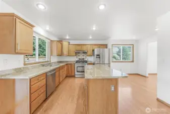 Beautiful kitchen with huge island and all granite countertops