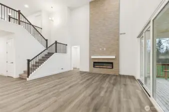 Great Room with double tall ceiling and multi-slide doors