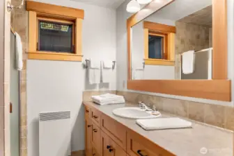 3/4 Bath has ceramic tile floor. Heated. Shower.
