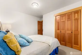 Bedroom 2, main level, is carpeted, has closet and baseboard heat.