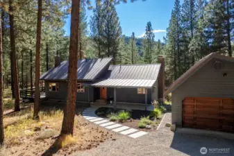 So private, this well built home enjoys super nice acreage that borders thousands of Acres of Forest land. No future development here. Detached Garage is 2 car 672 sf. Shed roof off South side of garage.
