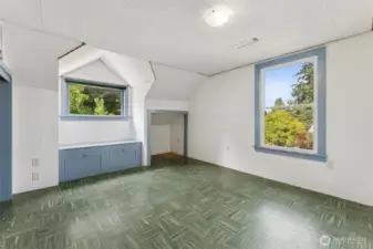 Upper Bedroom #3 with cute built ins and dormer.