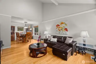 Vaulted ceilings with open beam accent. Room feels large.