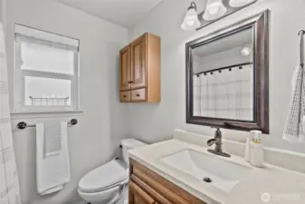 Bathroom upstairs serving other bedrooms. Newly re-done.