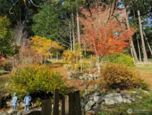 Thoughtfully planned terraces with gorgeous stones make this garden area easy to explore and enjoy.