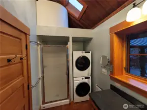 Guest bath with laundry and shower.