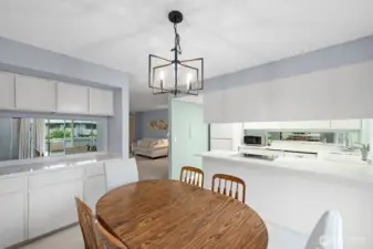 Dining Room with built-in, open to the Kitchen and Living Room