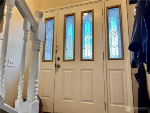 Beveled glass doors.