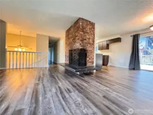 Spacious dining room opens up to a large deck in the back.