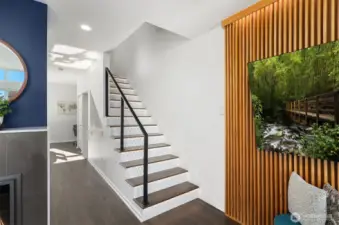 The recent $100k remodel was COMPREHENSIVE, including hardware, stairs, custom lighting, stair railing, feature wall, primary bath, kitchen, and the list goes on.