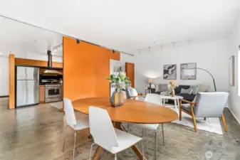 The open layout plan with a movable jigsaw puzzle wall is perfect for living and entertaining.