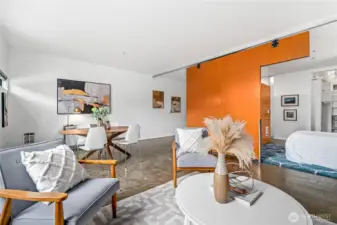 The open layout plan with a movable jigsaw puzzle wall is perfect for living and entertaining.