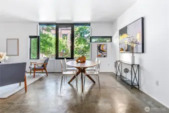 Spacious, bright and airy, this modern Capitol Hill condo provides an in-city retreat with large windows and aesthetically pleasing concrete floor.