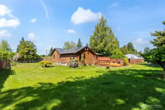 The yard is a perfect blend of landscaped and some woodsy areas in back.