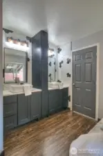Custom tile sink surround with plenty of storage space