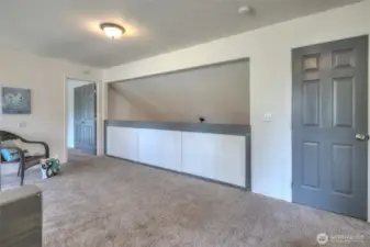 Catwalk to 3rd bedroom. What a perfect place for a home office