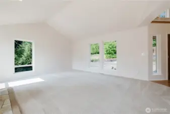 Step into a family room designed to be the heart of your home, where comfort and style come together effortlessly. Sunlight pours in through generous windows, flooding the room with abundant natural light that highlights its open layout. this versatile room adapts to your lifestyle. With its welcoming atmosphere.