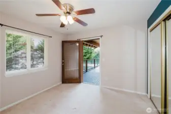 View of bedroom 1 with access to the outer deck