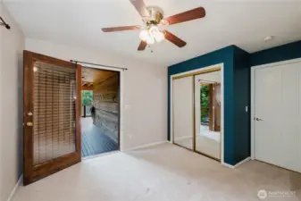he second bedroom, a cozy yet elegant space, boasts a unique feature: its own private access to the main outer deck. This thoughtful design offers owner or guests a personal retreat while still being connected to the heart of outdoor activities. Providing a perfect blend of comfort, privacy, and connection with nature.