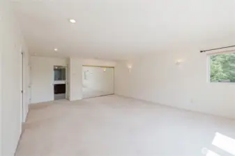 Primary bedroom with Walk-in closet to the left sliding mirrored closet to the right and primary 5 pc bathroom.