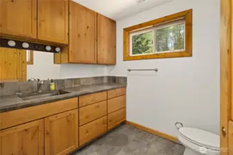 Additional 1/2 bath off the garage