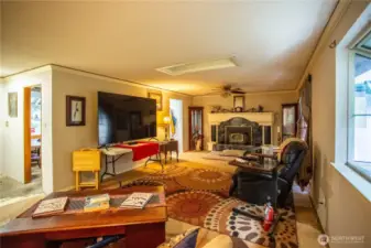 full view of the living room, sliding door to the back deck