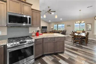 Kitchen opens to dining and living room.