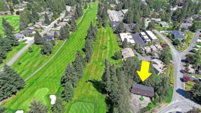 Aerial view of the property and golf course