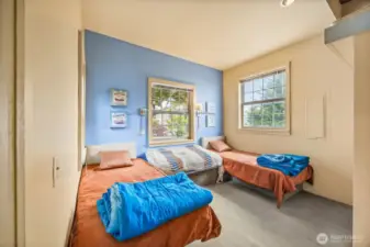 The third bedroom also features plenty of space and a sizable closet, making it ideal for guests, a home office, or additional family members.