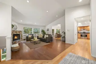 The open floor plan on the main level is thoughtfully crafted with flowing spaces and open vaulted ceiling.
