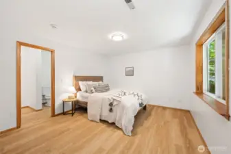 Downstairs, enjoy two more bedrooms, a spacious family room, and an additional 575 sq ft of unfinished flex space currently set up as a home gym.