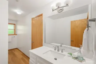 The downstairs bathroom is a perfect guest space for friends or family.