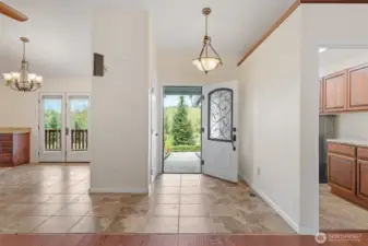 Welcoming front entry with concrete ramp for effortless accessibility.