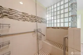 Built-in shower bench adds ease and luxury to daily living.