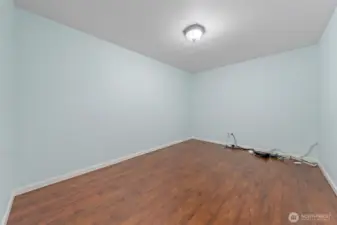 Versatile third room: ideal as an office, guest room, or hobby space.