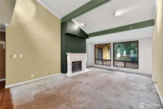 Main floor living room - carpet removed for your choice of flooring.