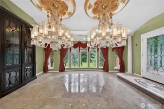 Elegant dining room with view of golf course.