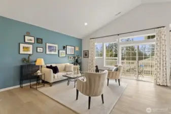 Vaulted ceilings and large windows fill every space with fantastic natural light.