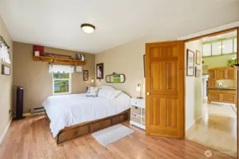 Main floor Primary bedroom suite.