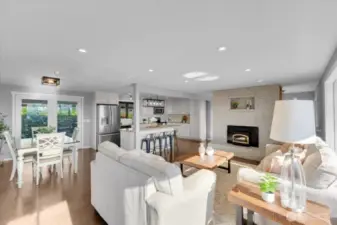 Looking towards kitchen and French doors to back yard (left)