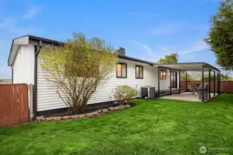 Back yard with covered patio