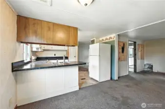 Dining area looking into kitchen