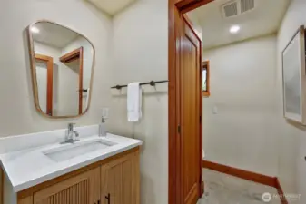 Powder room and laundry on main level.