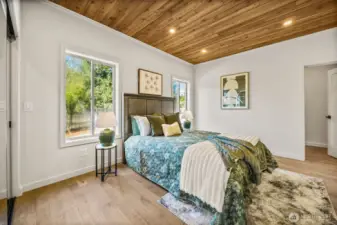 Here is the main floor bedroom ensuite.  there is a spacious storage area through the door in addition to the closet here.