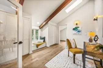 Office, den, work out space...  The upstairs has solid wood beams and skylights for a bright interior.