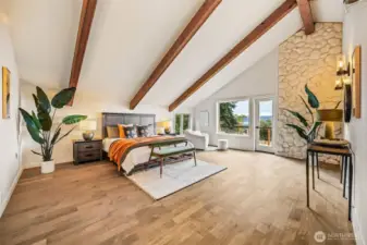 Primary bedroom is large enough for all your furniture and a seating area.  Again here you can walk out to the upstairs deck.