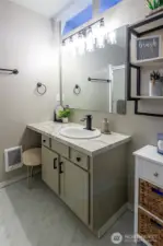 The en-suite bath is spacious and includes a vanity area too!