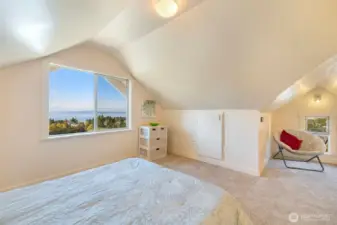 In the primary, looking at a cute reading nook with a view from the window.