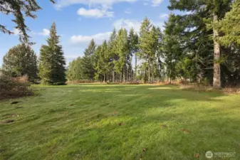 Mature trees, open space, privacy, rural but close in; plenty of room.