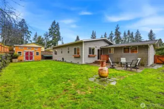 Enjoy the huge, private, fully fenced and level backyard with plenty of space for outdoor living.
